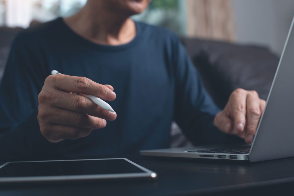 man using laptop, ipad